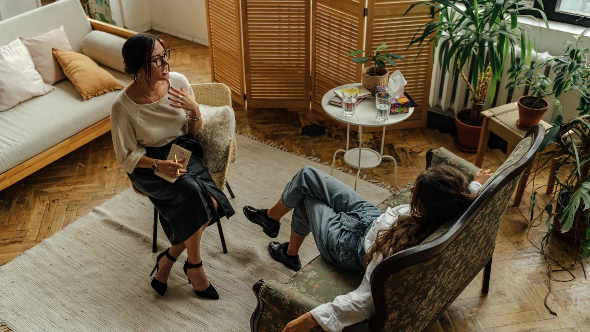 A therapist offering their advice to a patient.